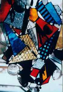 Stained glass window by Kristina Birkhans, links to her gallery page.